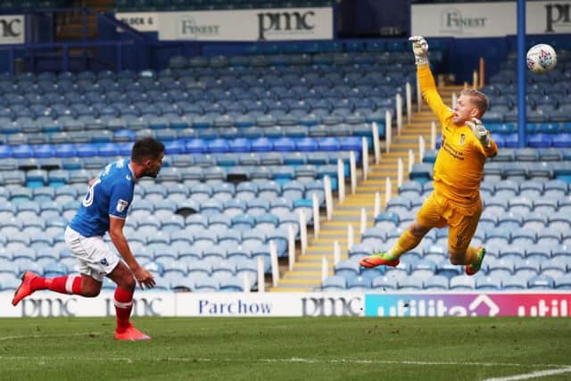 Gareth Evans heads home against Northampton. Picture: Joe Pepler
