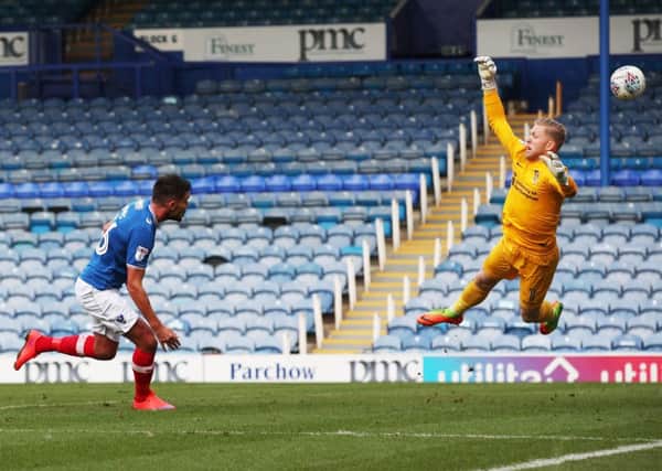 Gareth Evans heads home against Northampton. Picture: Joe Pepler