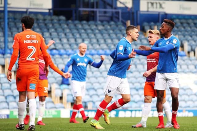 Stuart O'Keefe, left, celebrates his goal with Jamal Lowe. Picture: Joe Pepler