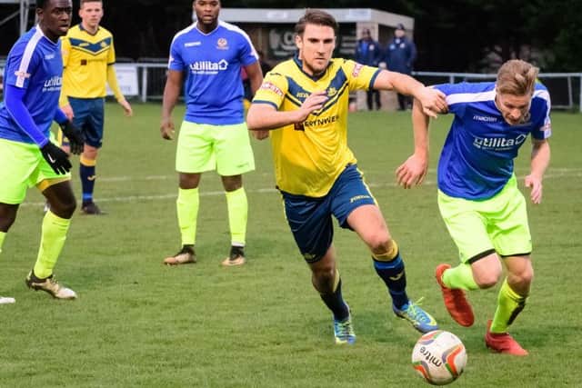 Moneys player Joseph Briggs races for the ball in the Bedford penalty area. Picture: Keith Woodland