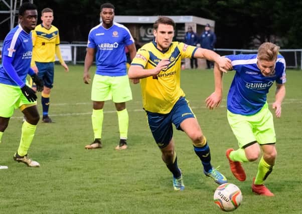 Moneys player Joseph Briggs races for the ball in the Bedford penalty area. Picture: Keith Woodland