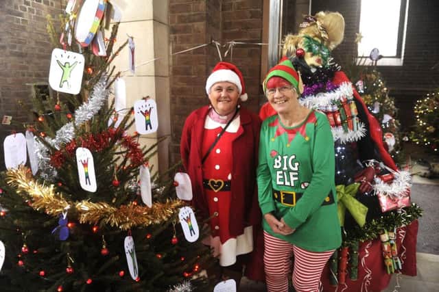 02/12/17
Christmas tree festival at St Cuthbert's Church in Copnor. (left to right), Reverend Kate Marlow and Mary Bish.
Picture Ian Hargreaves (171668-1) PPP-170312-113643006