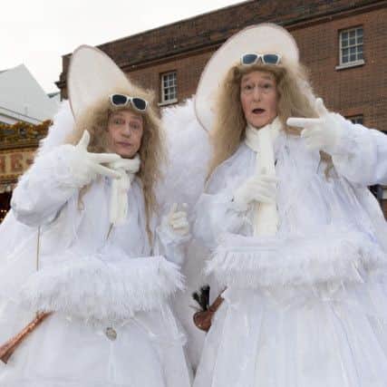 The 'Larkin about Angels' entertain visitors to the Victorian Festival of Christmas