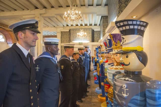 HMS Queen Elizabeth crew come face to face with 12 life-sized nutcrackers on parade at Portsmouth Historic Dockyard