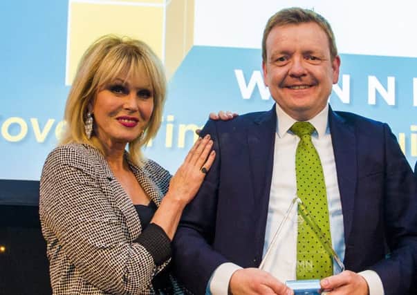 Joanna Lumley with Neil Woods, timber director at Covers