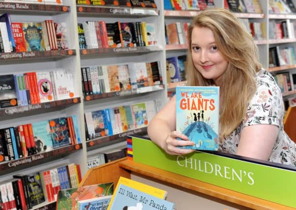 Amber Lee Dodd from Portsmouth, who used to work at Blackwells at the University of Portsmouth, launched her debut novel We Are Giants there last year Picture: Sarah Standing (160532-8758)
