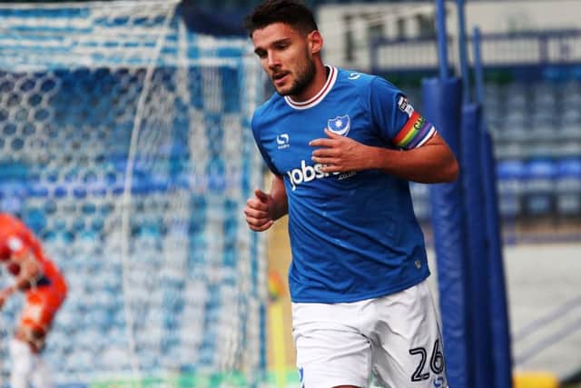 Gareth Evans failed to get over-excited by his opening goal in the Checkatrade Trophy win against Northampton amid thousands of empty seats at Fratton Park Picture: Joe Pepler