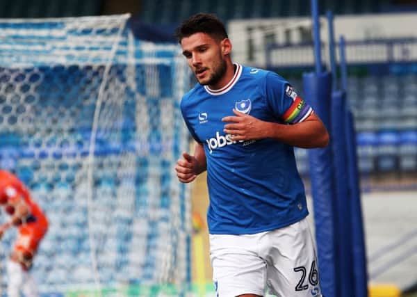 Gareth Evans failed to get over-excited by his opening goal in the Checkatrade Trophy win against Northampton amid thousands of empty seats at Fratton Park Picture: Joe Pepler