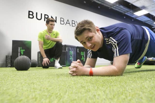 David George with Village Gym personal trainer Rich Higgins Picture: Habibur Rahman