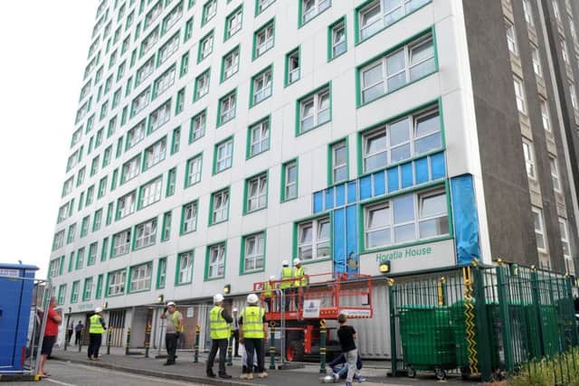 Cladding being removed from Horatia House and Leamington House earlier this year