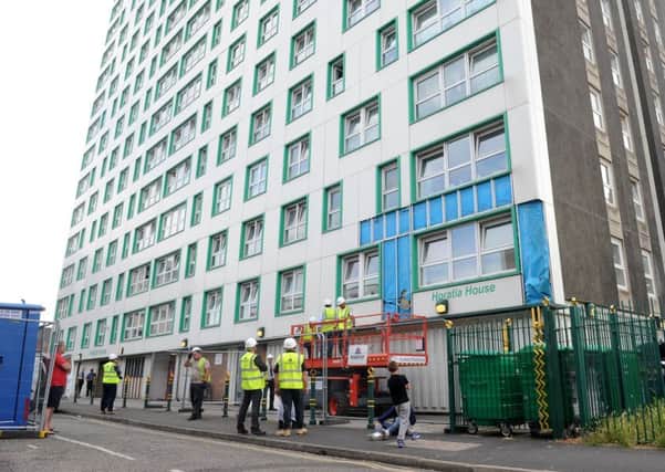 Cladding being removed from Horatia House and Leamington House earlier this year