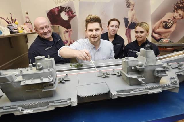 David Duncan and his staff at 3D Cakes. Picture: Greg Macvean