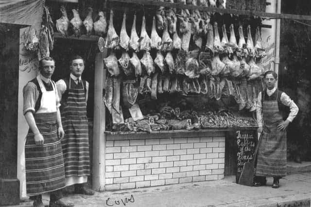 NO FLIES ON US LADY.A Portsmouth butchers in the 1920s. All in the open