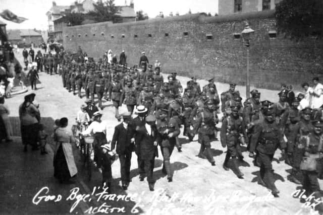 Arriving at the Royal Marine Barracks are soldiers of the Hampshire Regiment returning from France in 1919. (Robert James collection)