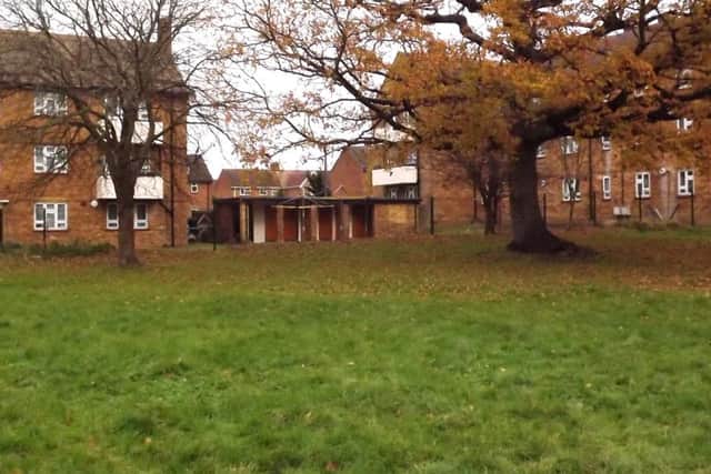 The same location today with the former Poplar Farm gone forever. Purbrook Way is behind the flats.