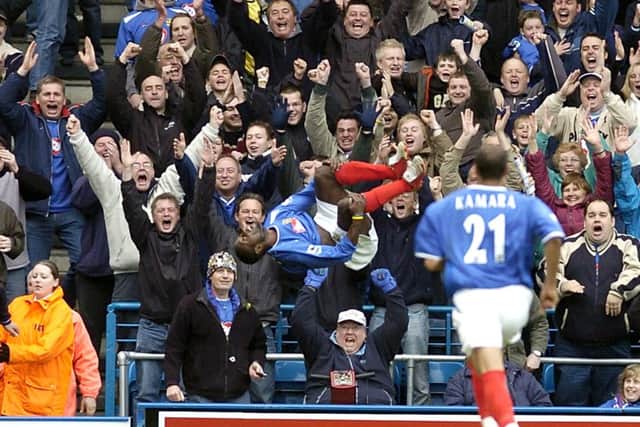 Portsmouth's Lomana Lualua celebrates scoring his goal against Charlton Athletic