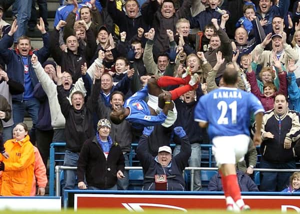 Portsmouth's Lomana Lualua celebrates scoring his goal against Charlton Athletic
