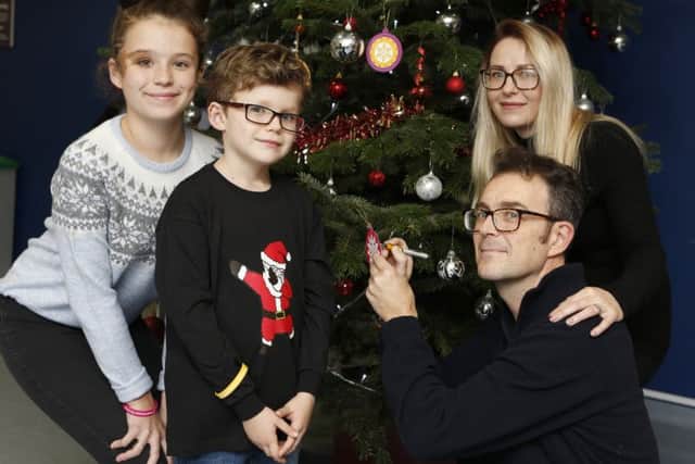 The Kingston family,  Jessica, 11, Charlie 8, Kim and David Kingston decorate the Hope Tree. Picture : Habibur Rahman