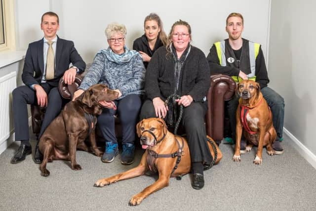 Tyler Daly, Maxine Gale, grandmother Ria Daly, mother Sharon Daly, Aaron Dal and dogs Ted, Beau and Frankie