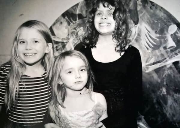 Daisy Lloyd, right, and her two sisters are supporting the Sick Children's Trust Christmas appeal