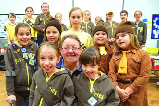 Liz Bartlett, 65, with members of the 3rd Portchester Brownie troop