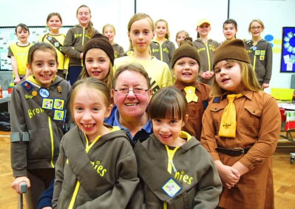 Liz  Bartlett, 65, with members of the 3rd Portchester Brownie troop