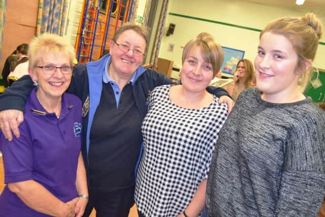 From left, Sue Pibworth, Liz's sister who is also in the Brownie troop, Liz Bartlett, Liz's nieve Heidi Richards, 36, who was invested in the 3rd Portchester Brownies by her aunt, and Liz's great-niece Chloe-Ann Richards, 16, who also used to be a Brownie at the group