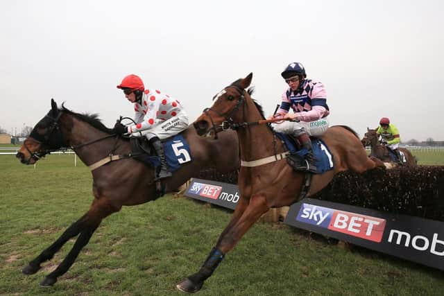 Jamie Moore riding Leo Luna, right