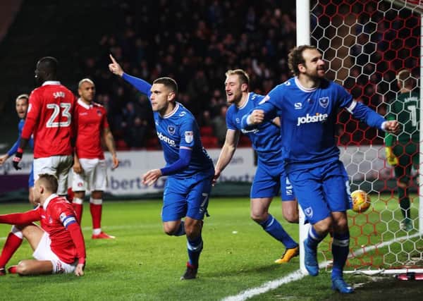 Pompey celebrate after Josh Magennis put the ball into his own net at Charlton Picture: Joe Pepler