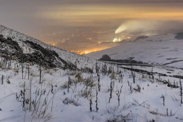 Snow covers the landscape in the Hope Valley, Peak District National Park