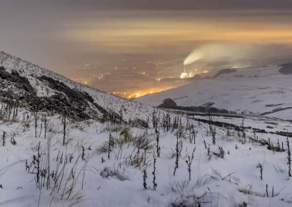 Snow covers the landscape in the Hope Valley, Peak District National Park
