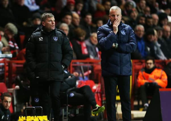 Pompey boss Kenny Jackett, right, and Joe Gallen watch on from the touchline during Pompey's win at Charlton. Picture: Joe Pepler