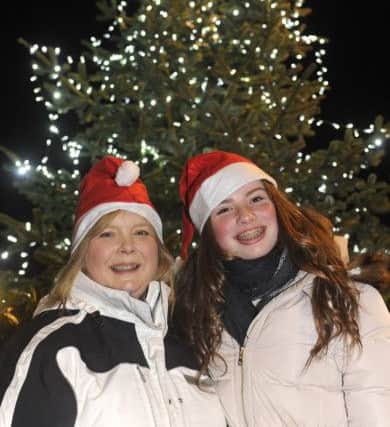 Michelle Houghton and her daughter Clara, 13,enjoy the lights Picture: Ian Hargreaves  (171676-1)