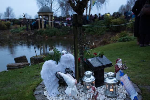 Lanterns were lit and placed at memorials to loved ones Picture: Vernon Nash