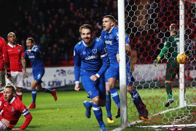 Pompey celebrate their goal at Charlton. Picture: Joe Pepler