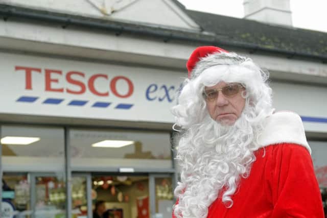 Rod Elliott, Hayling Island Lions Club volunteer Santa, outside Tesco Express, Station Road, Hayling Island. He was thrown off the site on Saturday after coming to give children presents and fundraise near the store's entrance. Picture: Ian Hargreaves