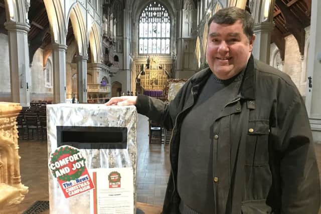 The Rev Canon Bob White with the Christmas campaign postbox
Picture: Byron Melton