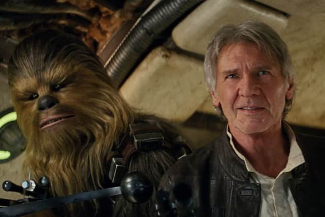 Chewbacca (Peter Mayhew) and Han Solo (Harrison Ford) Film FrameÂ©Lucasfilm 2015