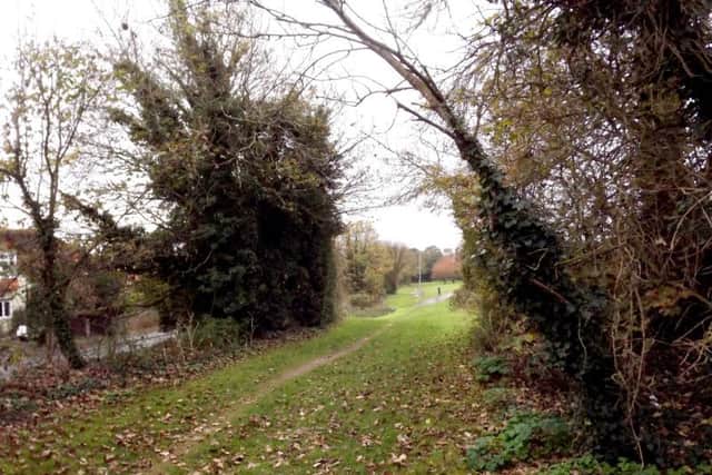 Overgrown and the embankment lowered, this is same view of the former Point A today.