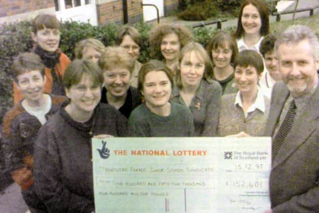 Some of the syndicate members with their cheque