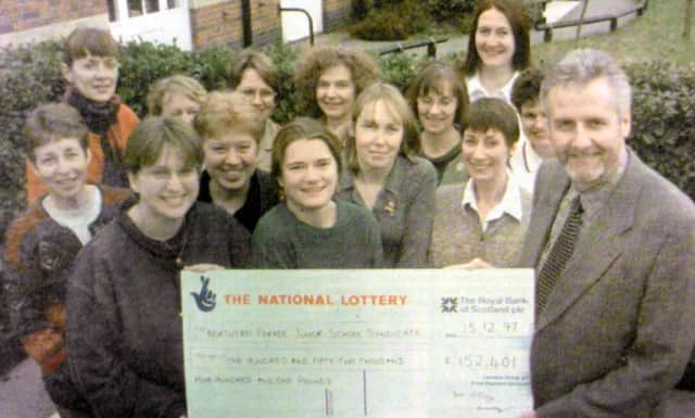Some of the syndicate members with their cheque