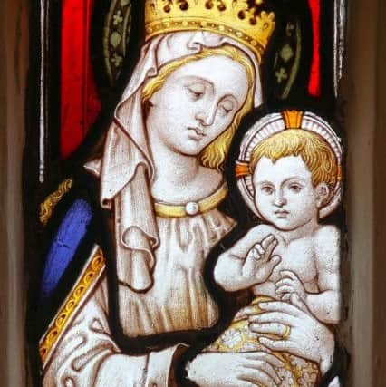 A stained-glass window in St Thomas Chapel in Portsmouth Cathedral, depicting Mary and Jesus