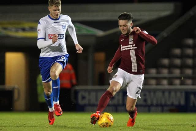 Michael Smith, left, in action for Bury this season Picture: Sharon Lucey