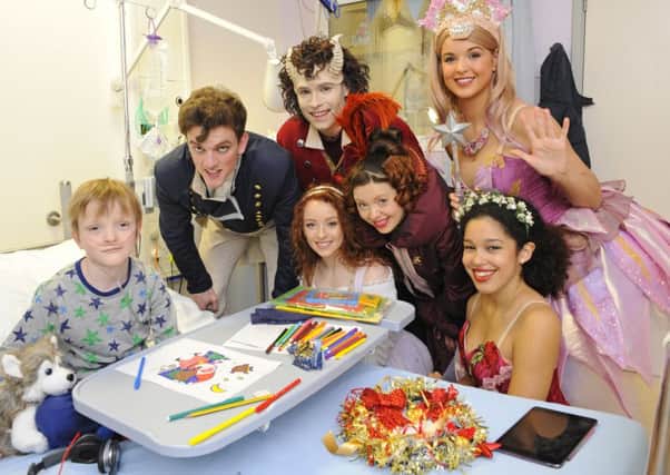 The cast of Beauty and the Beast visit Sam Merrick, aged 9, from Denmead at Queen Alexandra Hospital 

Picture by:  Malcolm Wells