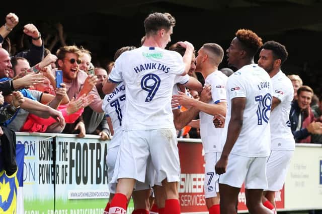 Pompey celebrated Brett Pitman's opening goal against AFC Wimbledon earlier this season