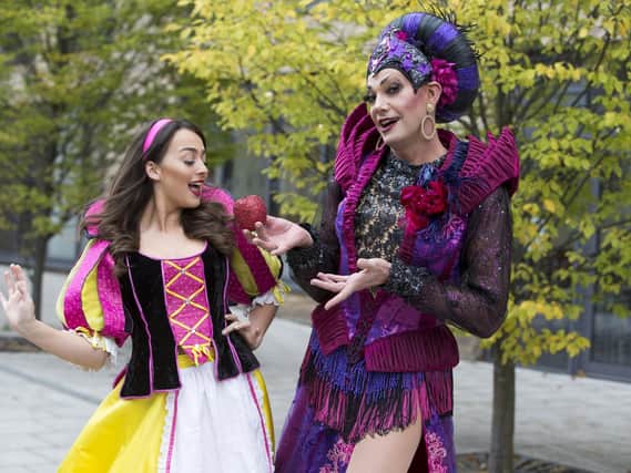 Charlotte Haines as Snow White and Craig Revel Horwood as The Wicked Queen in Snow White at Mayflower Theatre, Southampton