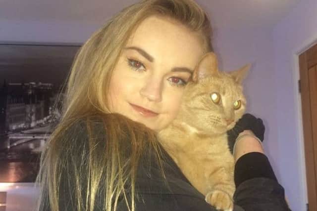 Esme Vine, 15, with Millie the cat