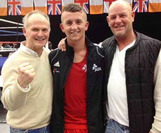CAPTION: From left, Colin Williams, national boxing champion Ben Bendle and Jason Evans
 PPP-170510-123050001