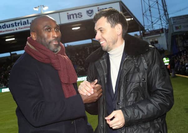 Sol Campbell and Svetoslav Todorov attended Pompey's win against Bury. Picture: Joe Pepler