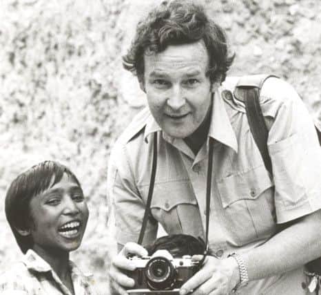 Trevor gives a photo lesson to curious youngsters in Rajasthan